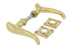 Door handles polished brass pair (1909)